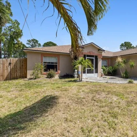 Buy this 3 bed house on 1319 Seabold Road Southwest in Palm Bay, FL 32908