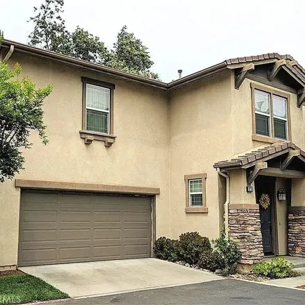 Rent this 4 bed townhouse on 376 Adobe Lane in Pomona, CA 91767