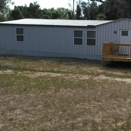 Buy this studio apartment on 3075 Se County Road 405 in Mayo, Florida
