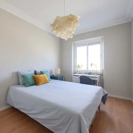 Rent this 6 bed room on Avenida São João de Deus in 1000-009 Lisbon, Portugal