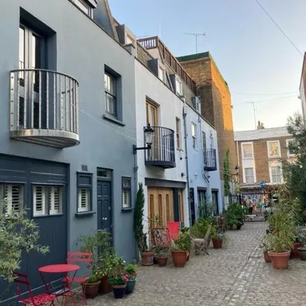 Buy this 2 bed house on Tesco Express in 224-226 Portobello Road, London