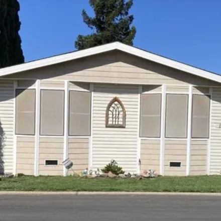 Buy this studio apartment on 11 River Bend Drive in Terminous, San Joaquin County