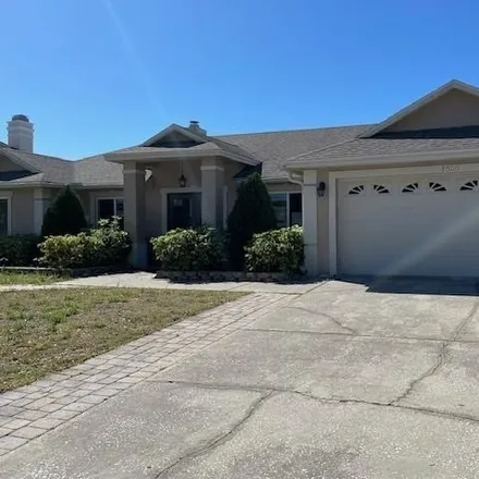 Rent this 4 bed house on 8624 White Rose Drive in Orange County, FL 32818