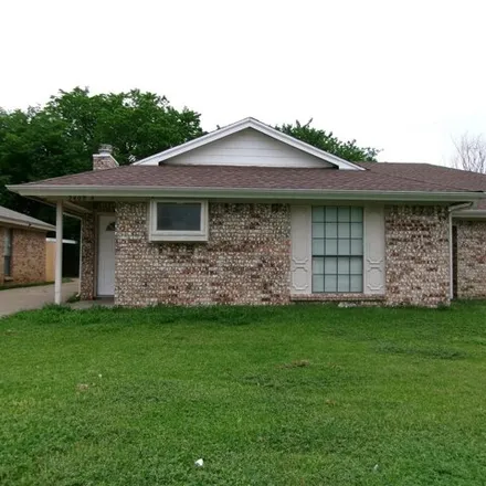 Rent this 3 bed house on 2400 Ventura Drive in Arlington, TX 76015