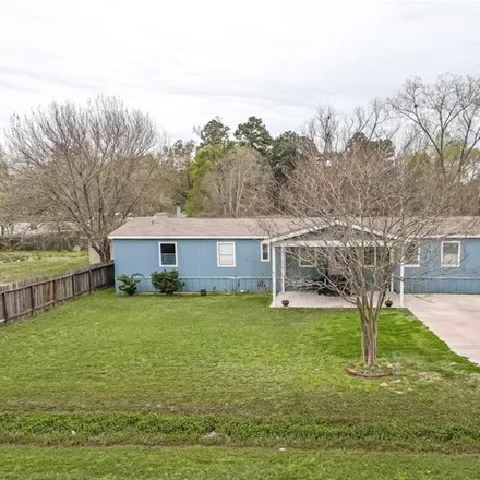 Buy this 4 bed house on 18592 Huckleberry Ln in Porter, Texas