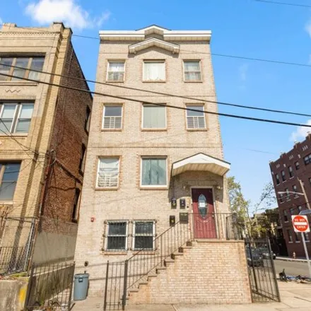 Buy this 11 bed house on 243 Dwight Street in West Bergen, Jersey City