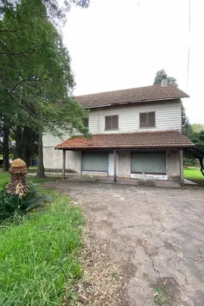 Buy this studio townhouse on Avenida General Pedro Díaz in Partido de Hurlingham, B1686 IRT William C. Morris