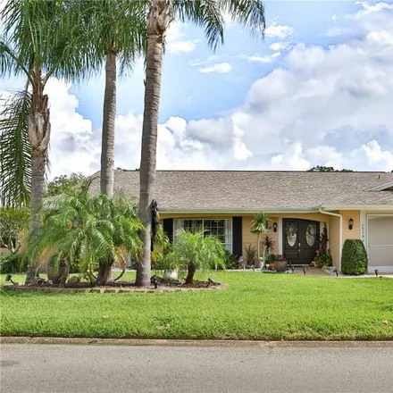 Buy this 4 bed house on 12704 Pinebrook Lane in Bayonet Point, FL 34667