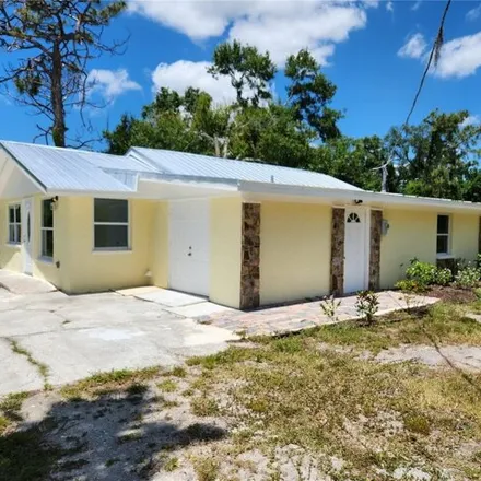 Buy this 3 bed house on 1232 Davis Lane in Englewood, FL 34224