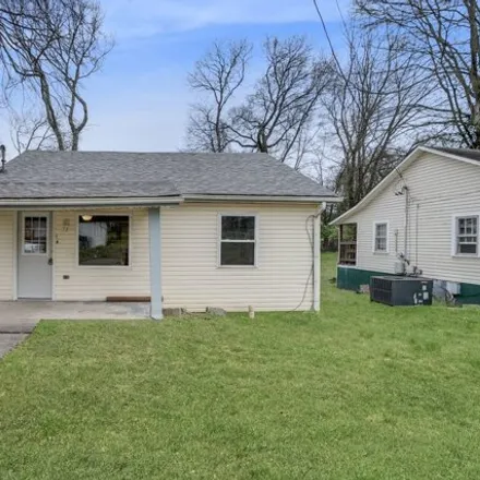 Buy this 3 bed house on James Corlew Dealership in 1122 Main Street, Clarksville