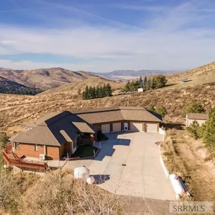 Buy this 4 bed house on 7688 Prospector Hollow Lane in Bannock County, ID 83201