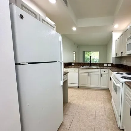 Rent this 2 bed apartment on Haverhill Road in Cypress Lakes, Palm Beach County