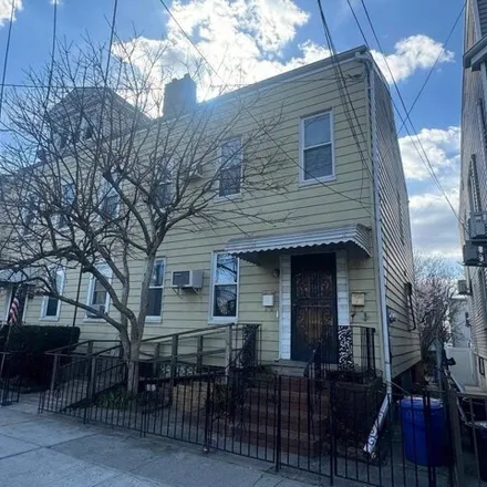 Buy this 4 bed house on 18-14 120th Street in New York, NY 11356