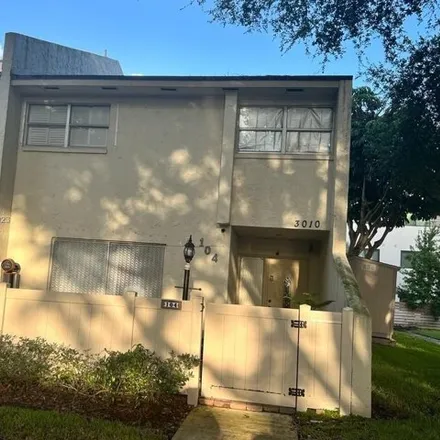 Buy this 4 bed townhouse on New Hope Christian School / Calvary Christian Academy West Campus in Northwest 31st Avenue, Palm Aire