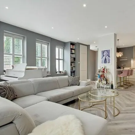 Rent this 3 bed apartment on 65 Hemstal Road in London, NW6 2AE