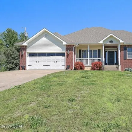 Buy this 4 bed house on 1517 S Duquesne Rd in Joplin, Missouri