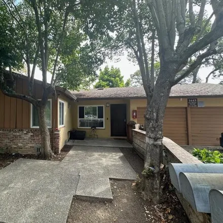 Buy this 4 bed house on 1643 Woodland Avenue in East Palo Alto, CA 94301