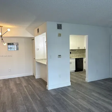 Rent this 3 bed apartment on 451 Northeast 207th Lane in Miami-Dade County, FL 33179