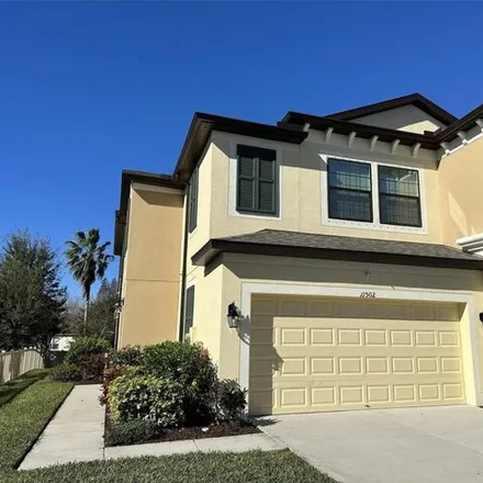 Rent this 3 bed house on 11462 Crowned Sparrow Lane in Citrus Park, FL 33626