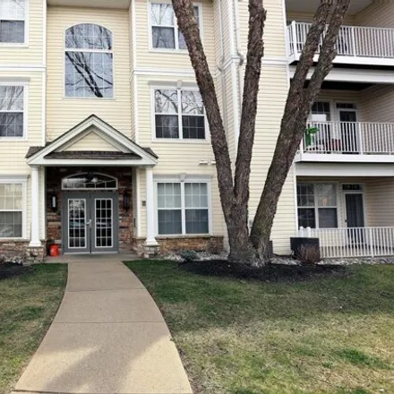 Rent this 2 bed condo on Saint Andrews Place in Manalapan Township, NJ