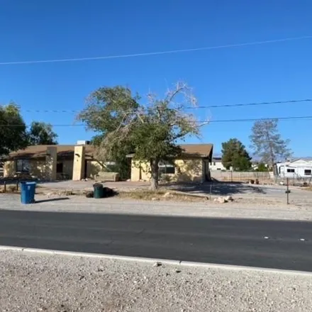 Buy this 4 bed house on 4801 Whispering Sands Drive in Las Vegas, NV 89131