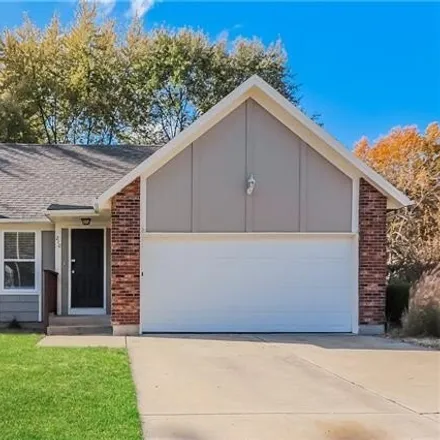 Rent this 4 bed house on 240 North Huntsman Boulevard in Raymore, MO 64083