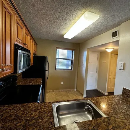 Rent this 1 bed apartment on 9825 Nob Hill Lane in Sunrise, FL 33351