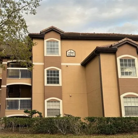 Rent this 2 bed condo on Hunter's Creek Golf Club in 14401 Sports Club Way, Orlando
