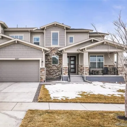 Buy this 4 bed house on 6687 South White Crow Court in Aurora, CO 80016