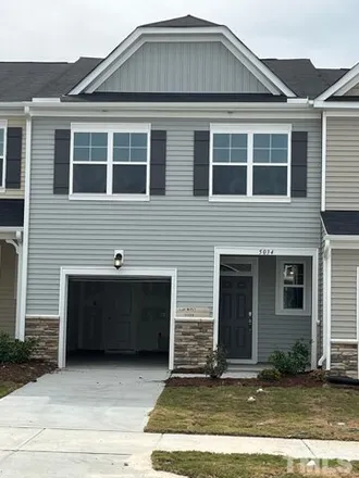 Rent this 3 bed townhouse on Kota Street in Raleigh, NC 27620