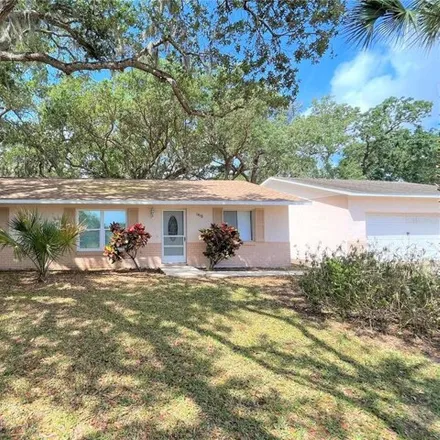 Rent this 4 bed house on 1418 Mango Tree Drive in Edgewater, FL 32132