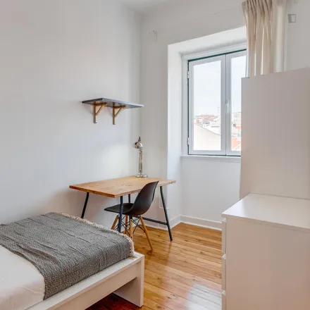 Rent this 7 bed room on Pastelaria Conde in Calçada do Marquês de Abrantes, 1200-719 Lisbon