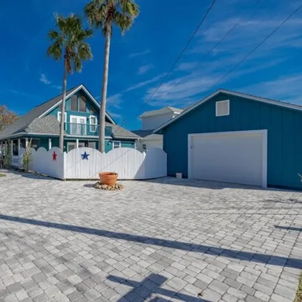 Buy this 4 bed house on 4015 Holiday Drive in Panama City Beach, FL 32408