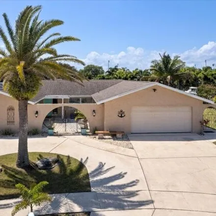 Buy this 4 bed house on 1301 Scorpious Court in Merritt Island, FL 32953