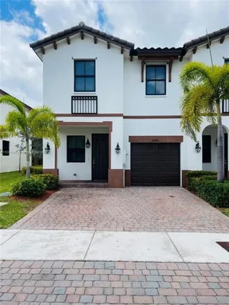 Buy this 4 bed townhouse on 8890 Northwest 103rd Path in Doral, FL 33178