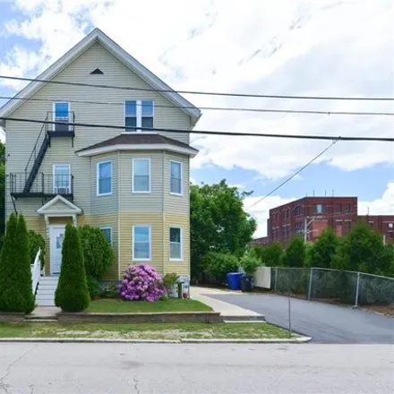 Buy this 9 bed house on 13 Hunts Avenue in Pawtucket, RI 02861