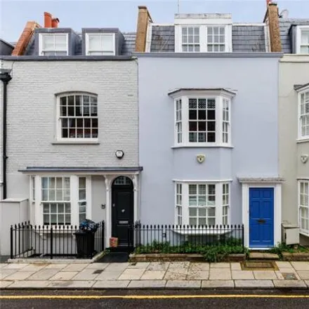 Buy this 4 bed townhouse on 39 Godfrey Street in London, SW3 3SU