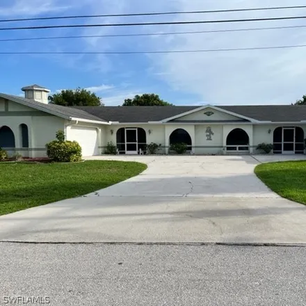 Rent this 3 bed duplex on 703 Southeast 7th Street in Cape Coral, FL 33990