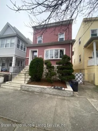 Buy this 4 bed house on 158 McClean Avenue in New York, NY 10305