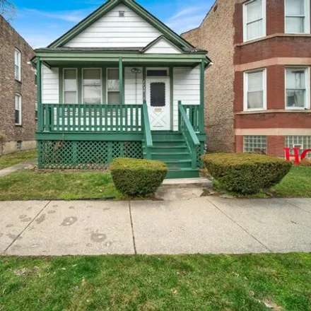 Buy this 2 bed house on 7130 South Cornell Avenue in Chicago, IL 60649