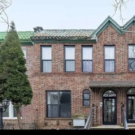 Buy this 7 bed house on 372 Rutland Road in New York, NY 11225