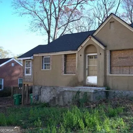 Buy this 3 bed house on 2073 Marco Drive in Candler-McAfee, GA 30032