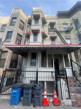 Buy this 12 bed townhouse on 1124 Fox Street in New York, NY 10459