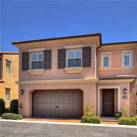 Rent this 3 bed condo on 21 Sedgewick in Irvine, California