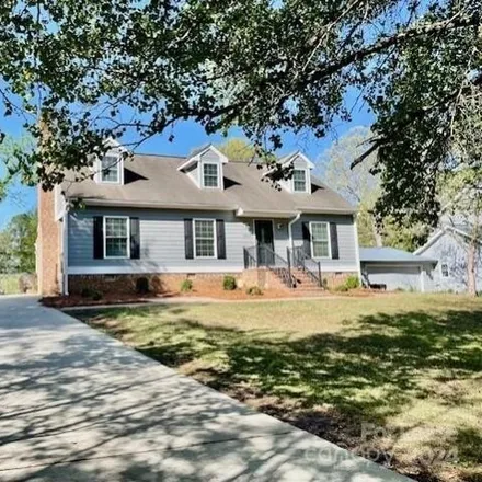 Rent this 4 bed house on 6263 Deep Forest Lane in Charlotte, NC 28214