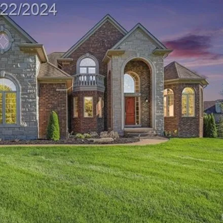Buy this 4 bed house on 64071 Turnberry Way in Washington Charter Township, MI 48095
