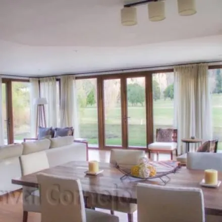 Rent this 3 bed house on Arelauquen Golf Club in Las Frambuesas, Villa Lago Gutiérrez