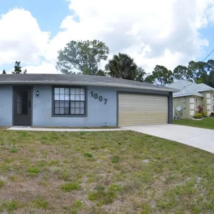 Rent this 3 bed house on 1001 Altamira Street in Palm Bay, FL 32907