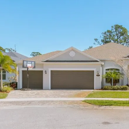 Buy this 4 bed house on Crossbill Avenue in Titusville, FL 32780