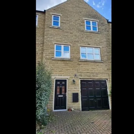 Rent this 4 bed townhouse on Southbrook Gardens in Lower Hopton, WF14 8LS
